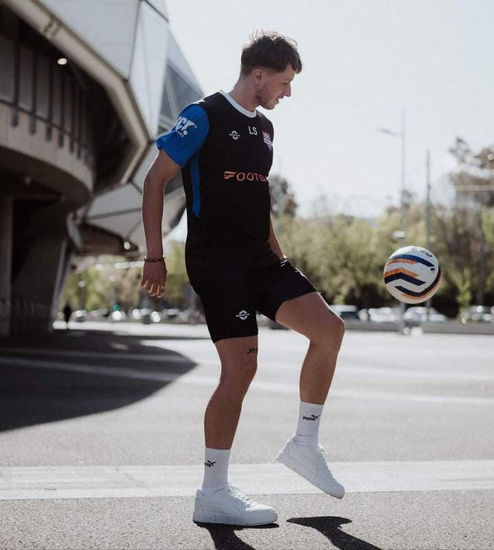 Powergoal Football Group coach controlling the ball in Melbourne